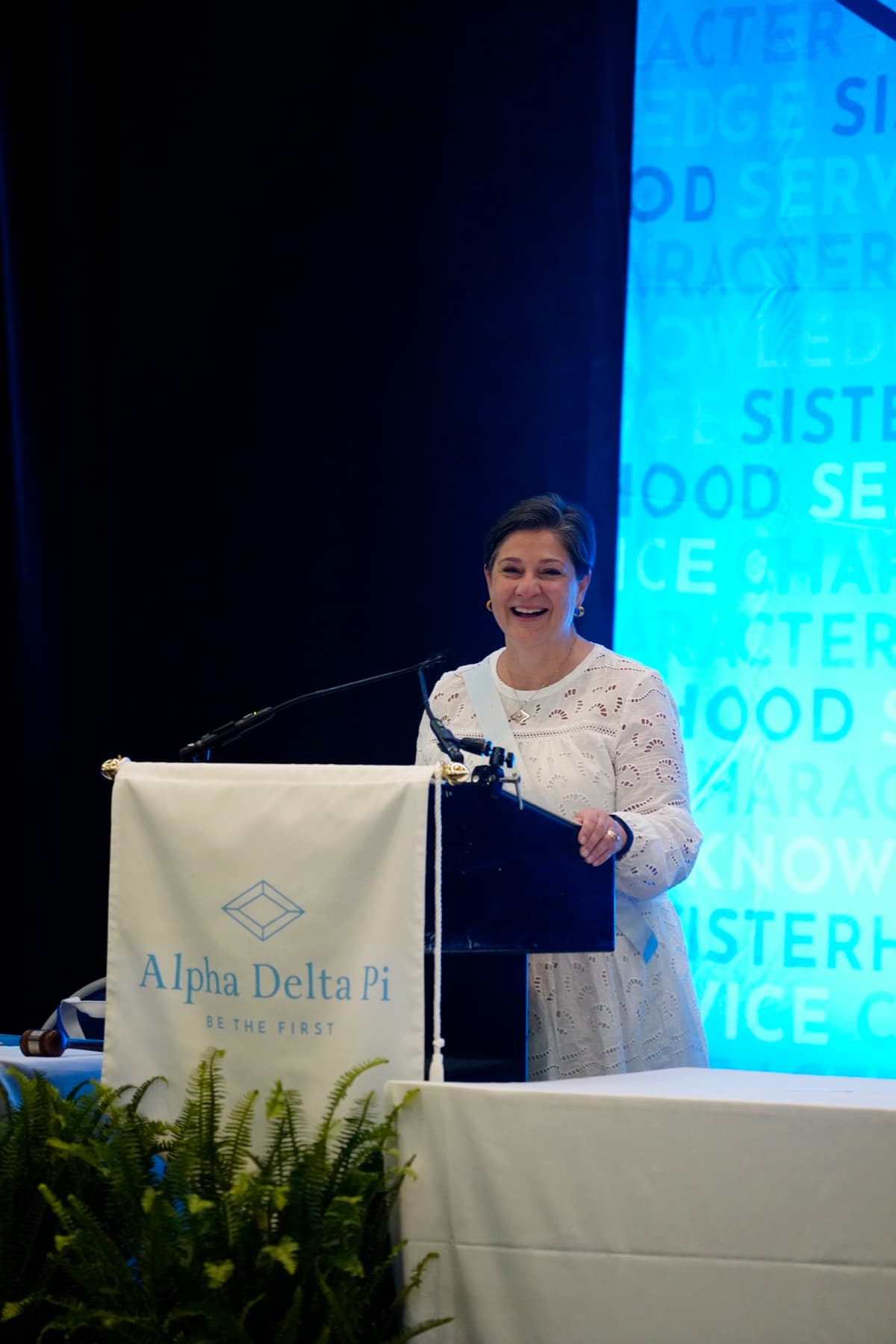 Dawn podium moment at Alpha Delta Pi convention